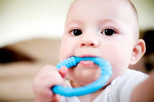 Evan chewing on teether