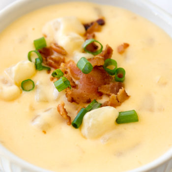 This easy crock pot cheesy potato soup recipe is the perfect family comfort food.